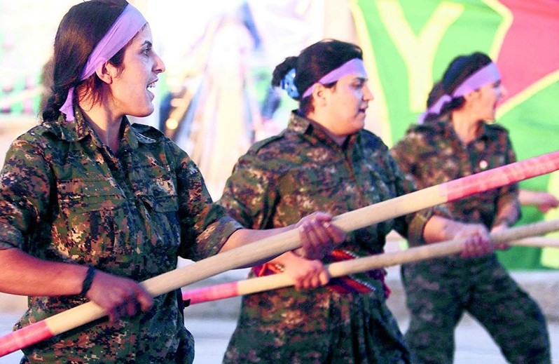 Silhan u00d6zu00e7elik (seen in the middle) was sentenced to 21 months of prison over ties to terrorist PKK.