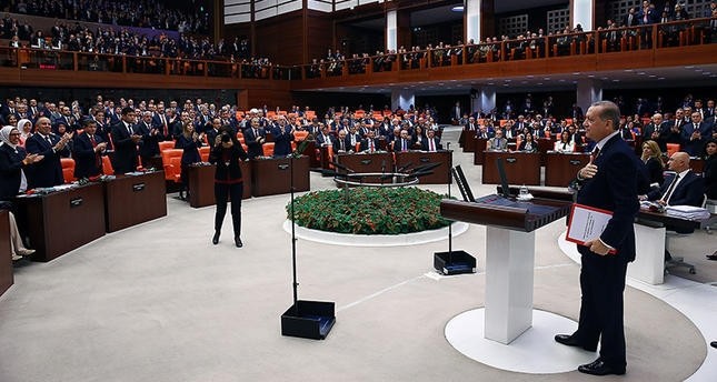 President Erdou011fan approaches to the rostrum at the Parliament to make his address for the first session of the new legislative year. (AA Photo)