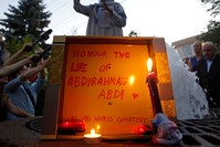  woman speaks during a vigil for Abdirahman Abdi, a Somali immigrant to Canada who died after being hospitalized in critical condition following his arrest by Canadian police, in Ottawa (Reuters Photo)