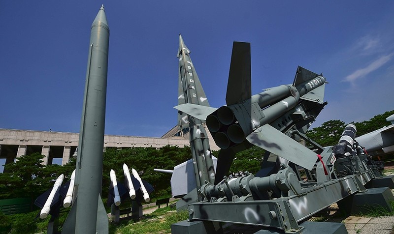 Replicas of a North Korean Scud-B missile (L) and South Korean Nike missiles are displayed at the Korean War Memorial in Seoul on July 19, 2016 (AFP Photo)