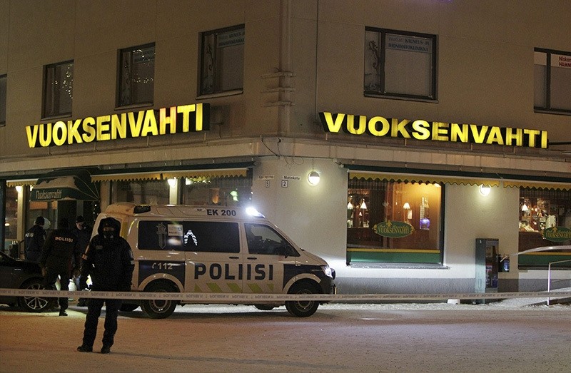 Police guards the area were three people were killed in a shooting incident at a restaurant in Imatra, Eastern Finland after midnight on December 4, 2016. (Reuters Photo)