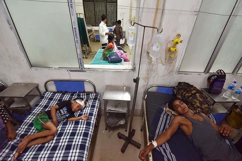 Indian villagers who were injured in a militant attack at Balajan Tinali, receive medical attention at Barpeta Medical College Hospital in Barpeta on August 5, 2016 (AFP Photo)