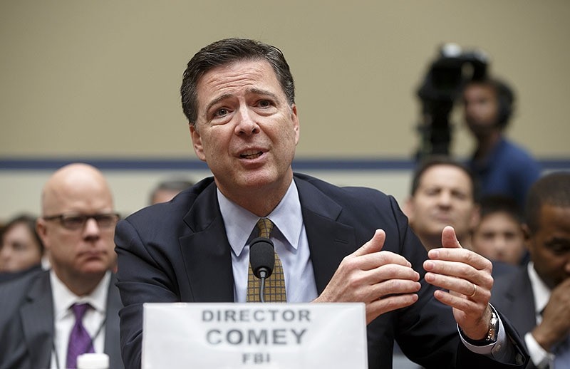 FBI Director James Comey testifies on Capitol Hill in Washington before the House Oversight Committee to explain his agency's recommendation to not prosecute Hillary Clinton. (AP PHOTO)