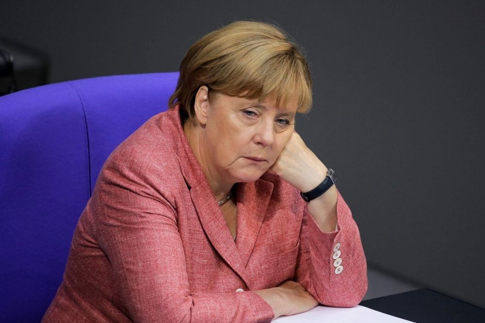 German Chancellor Angela Merkel resting her head as she attended the budget 2017 debate at the Bundestag in Berlin, Sept. 6.