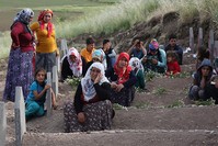 Family members of victims mourn at a cemetery in Du00fcru00fcmlu00fc village, the site of an explosion by PKK terrorists last week, near the southeastern city of Diyarbakir, Turkey May 19, 2016. (Reuters Photo)