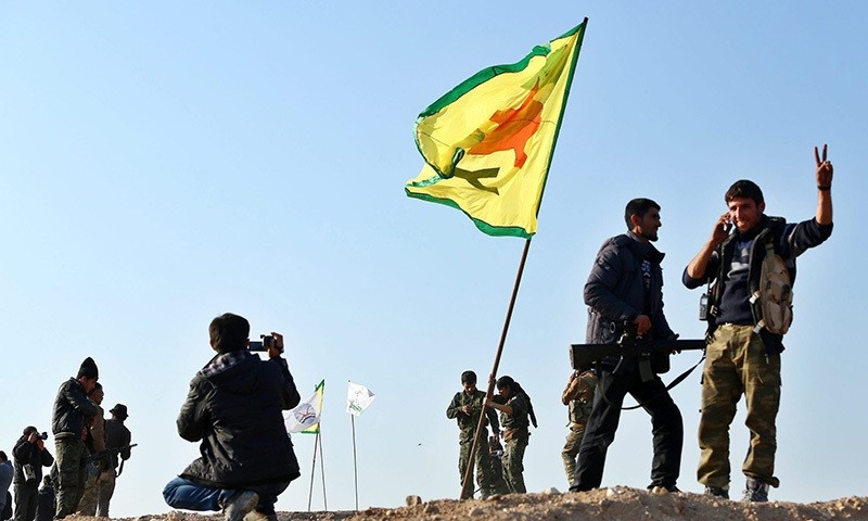 Members of the YPG celebrate their victory in Kobani, Syria, Jan. 26,  2015. (EPA Photo)