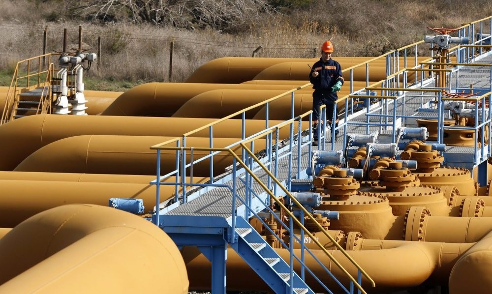 A file photo showing a worker checking equipment at a gas storage. 