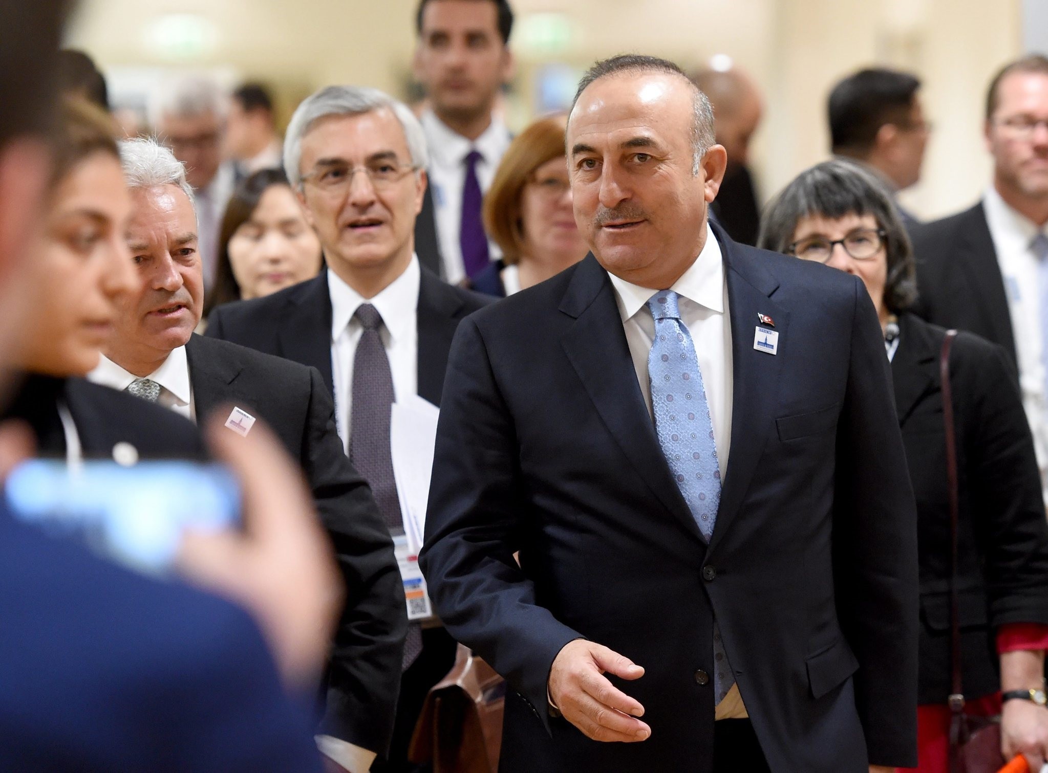 FM Mevlut Cavusoglu (C) and British Minister of State for Foreign and Commonwealth Affairs Alan Duncan (2-L) attend for the OSCE ministerial council in Hamburg. (EPA Photo)