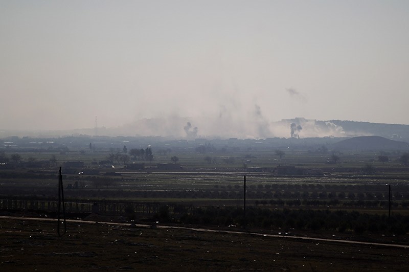 Smoke rises from Al-Bab as the opposition advance towards the town, in Syria January 22, 2017. (Reuters Photo)