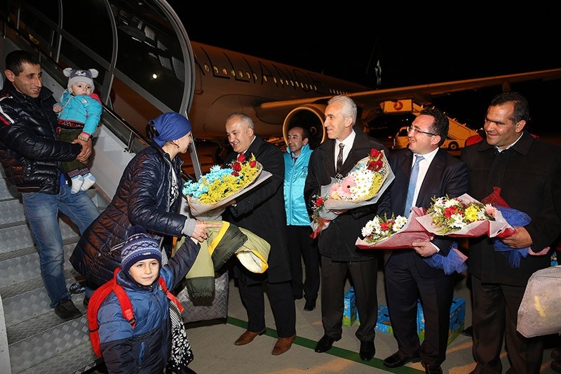 Turkish officials welcome Ahiska Turks at the airport, 18 November 2016. (AA Photo)