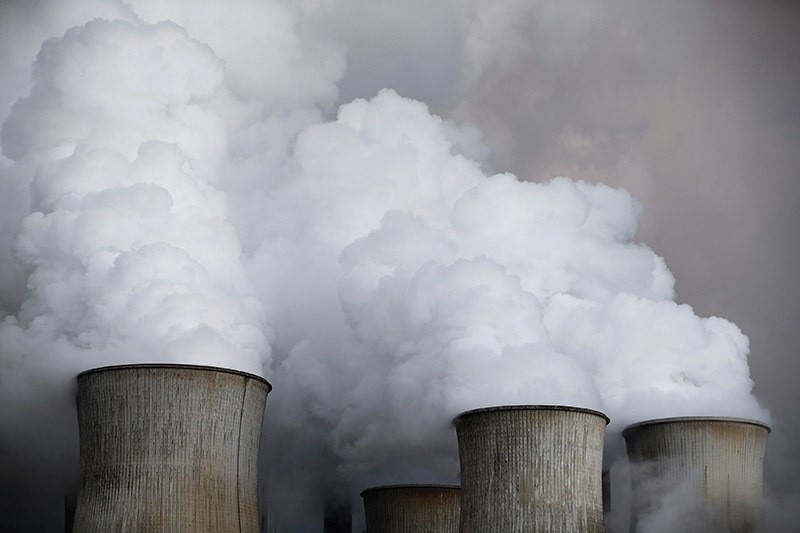 Steam rises from the cooling towers of a coal power plant in Germany. (Reuters Photo)