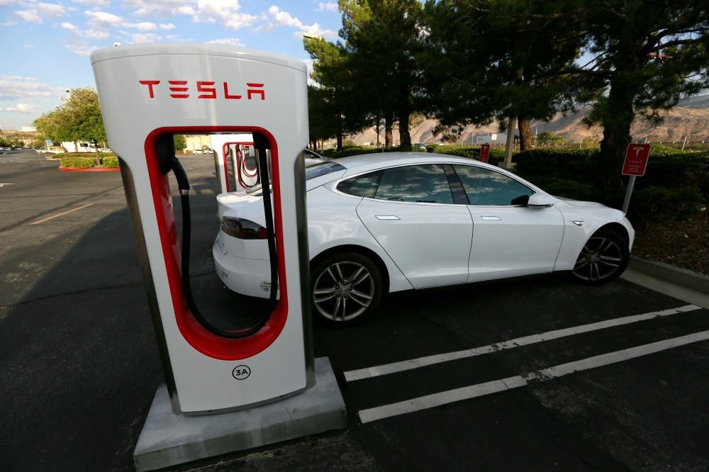 A Tesla Model S charges at a Tesla Supercharger station in Cabazon, California.