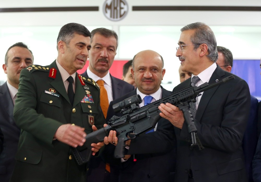 Defense Industries Undersecretary u0130smail Demir, the countryu2019s top defense procurement bureaucrat, handed rifles to Land Forces Commander Gen. Salih Zeki u00c7olak at a ceremony. 