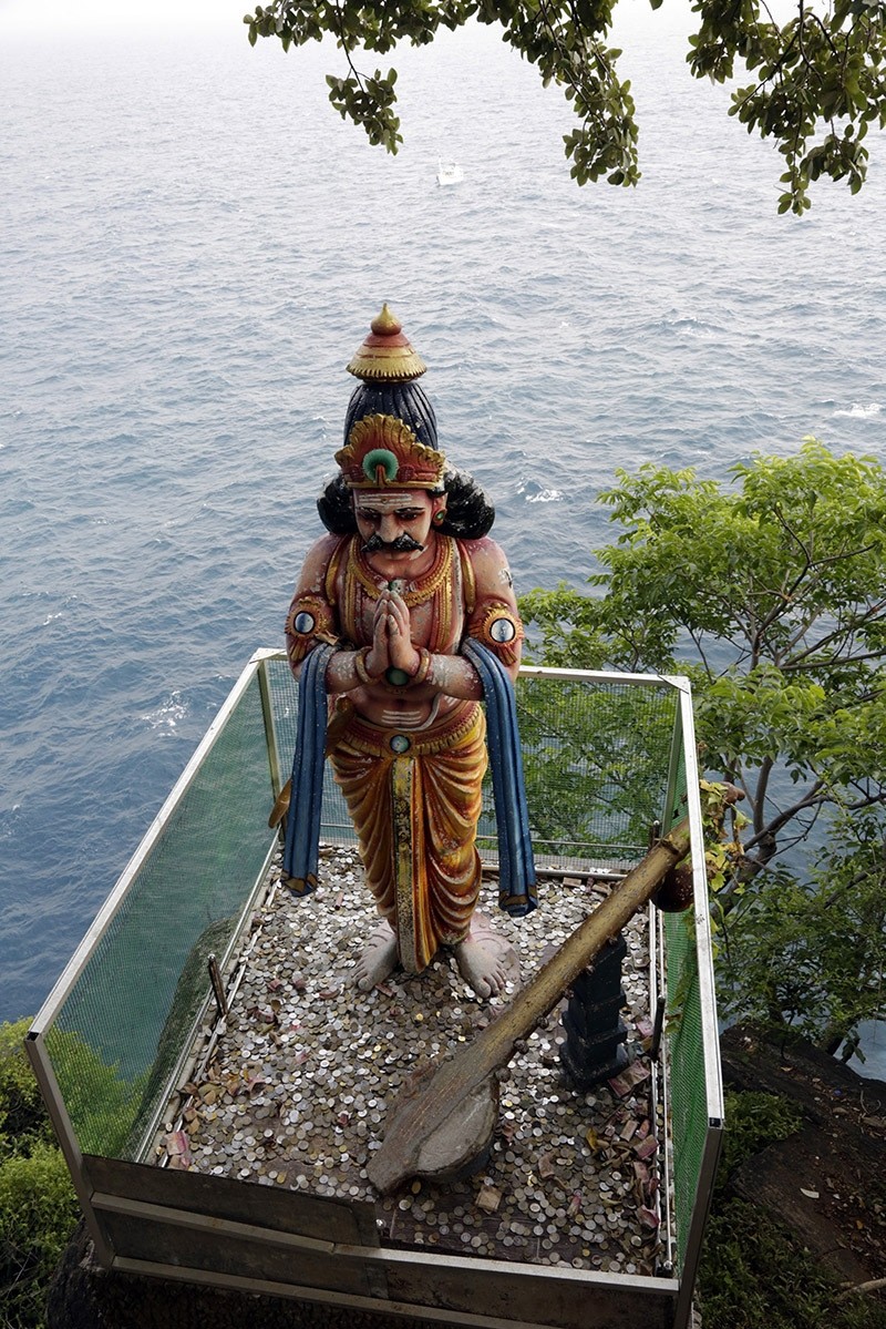 An image of a Hindu deity on the edge of the rocky cliff overlooking the Thiru Koneswaram Hindu temple. (EPA Photo)