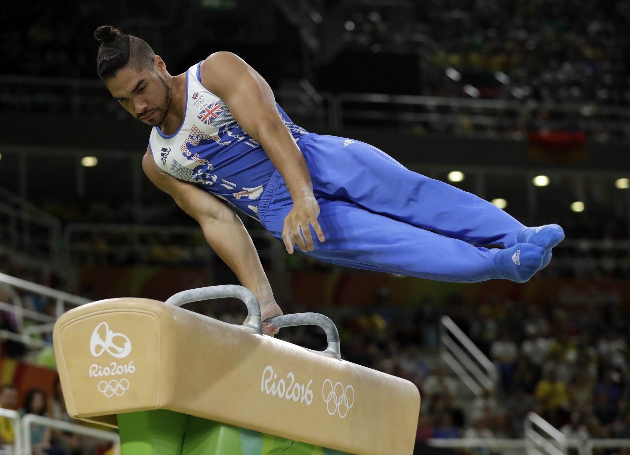 This is an Aug. 14, 2016 file photo of Britain's Louis Smith as he performs on the pommel horse during the artistic gymnastics men's apparatus final at the 2016 Olympics in Rio de Janeiro, Brazil. (AP Photo)