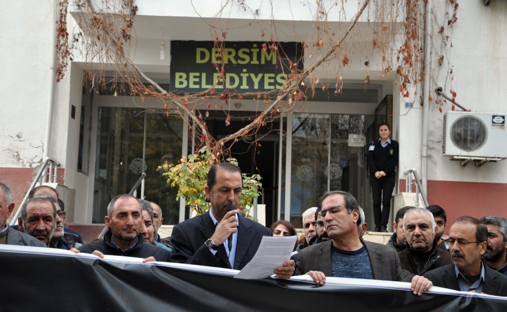 Pro-PKK DBPu2019s Tunceli co-chair Mehmet Ali Bul (C)