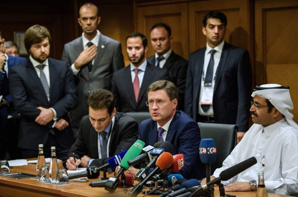 Russian Energy Minister Alexander Novak (C) speaks next to Mohammed bin Saleh al-Sada (R), President of OPEC and Qataru2019s Energy Minister during a press conference at the 23rd World Energy Congress in Istanbul Wednesday.