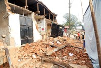 This photo taken on September 10, 2016 in Bukoba region in northwest Tanzania, shows houses damaged following an earthquake measured 5.7 magnitude which struck the countryu2019s Lake Zone. (AFP Photo)