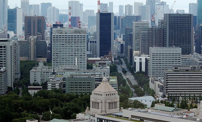 The Parliament Building (bottom) is seen in front of office buildings of government ministeries in Tokyo, Japan July 19, 2016. (Reuters Photo)