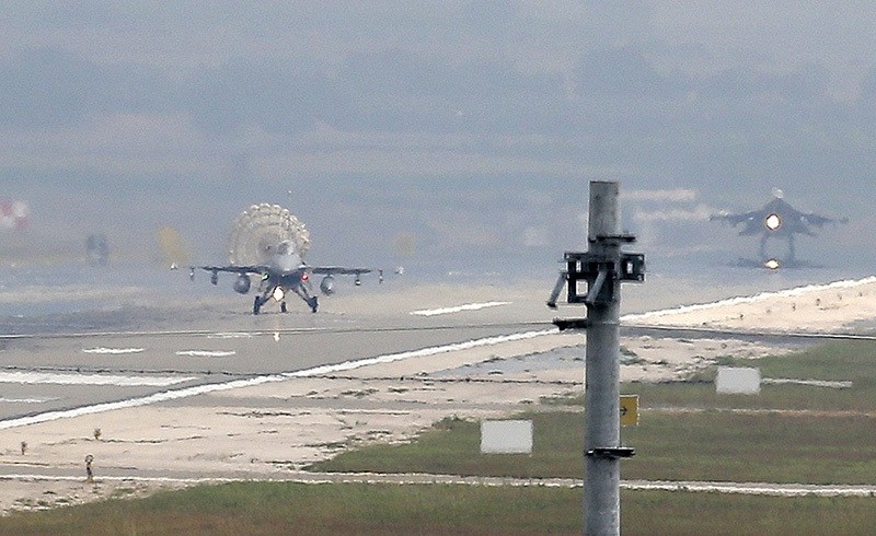 Turkish Air Force fighter planes land at u0130ncirlik Air Base, on the outskirts of the city of Adana, southern Turkey, July 30, 2015. (AP Photo)