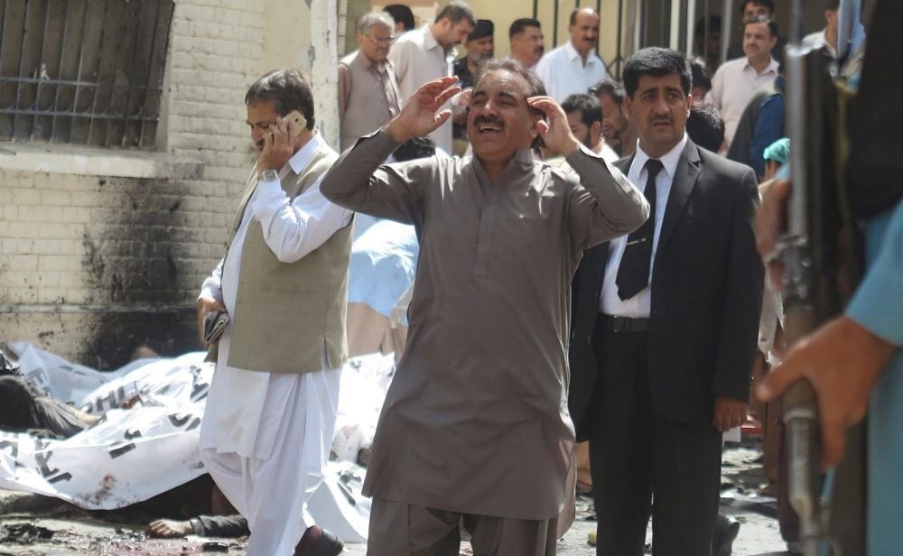A man reacts after a bomb blast in restive Quetta, Pakistan.