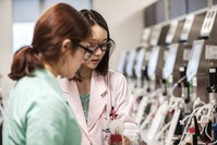 Employees work at Samsung Bioepis labs in Incheon.