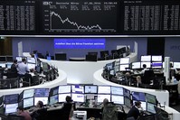 Traders work at their desks in front of the German share price index, DAX board, at the stock exchange in Frankfurt, Germany, June 27, 2016. (Reuters Photo)
