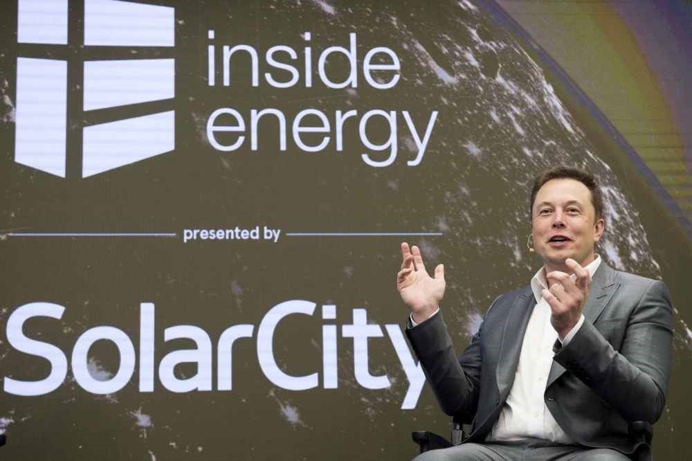 Elon Musk, CEO of SolarCity and Tesla Motors, speaks at SolarCity's Inside Energy Summit in New York last year. SolarCity built the most efficient solar panel in the industry for transforming sunlight into electricity.