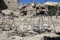 Swings are seen in a damaged site after airstrikes on the opposition-held Tariq al-Bab neighbourhood of Aleppo, Syria September 24, 2016 (Reuters Photo)
