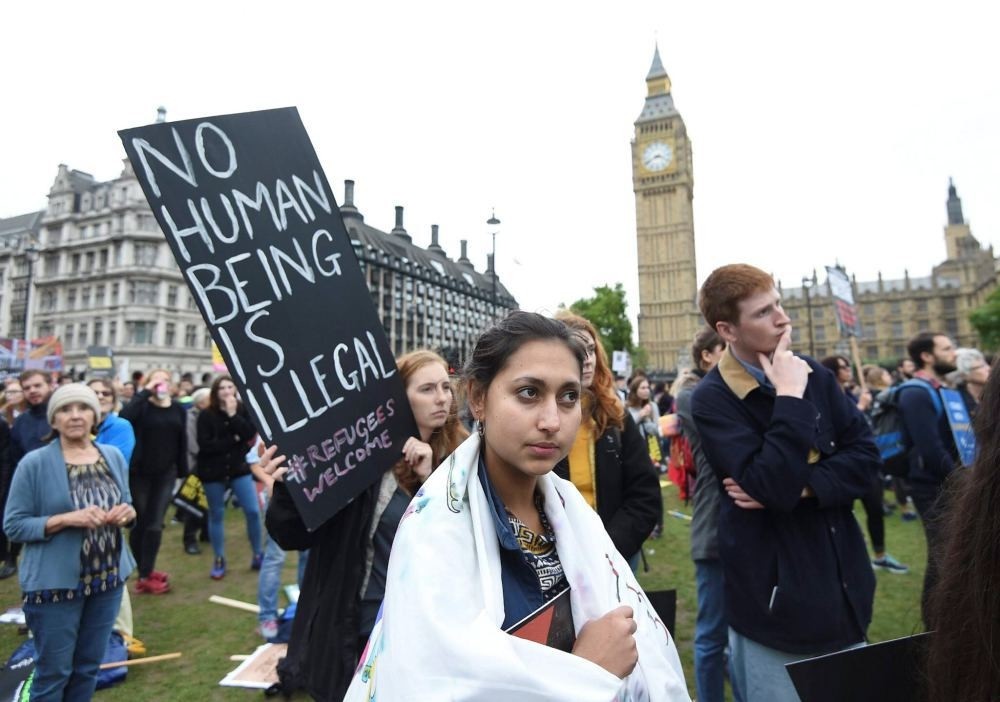 Protestors take part in the ,Refugees are Welcome, march in London, Britain, Sept. 17.