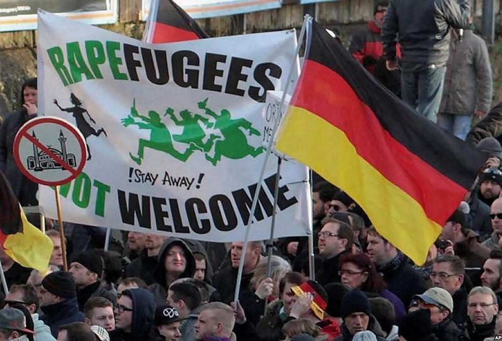 Supporters of far-right groups protesting against refugees and Islam in Germany.