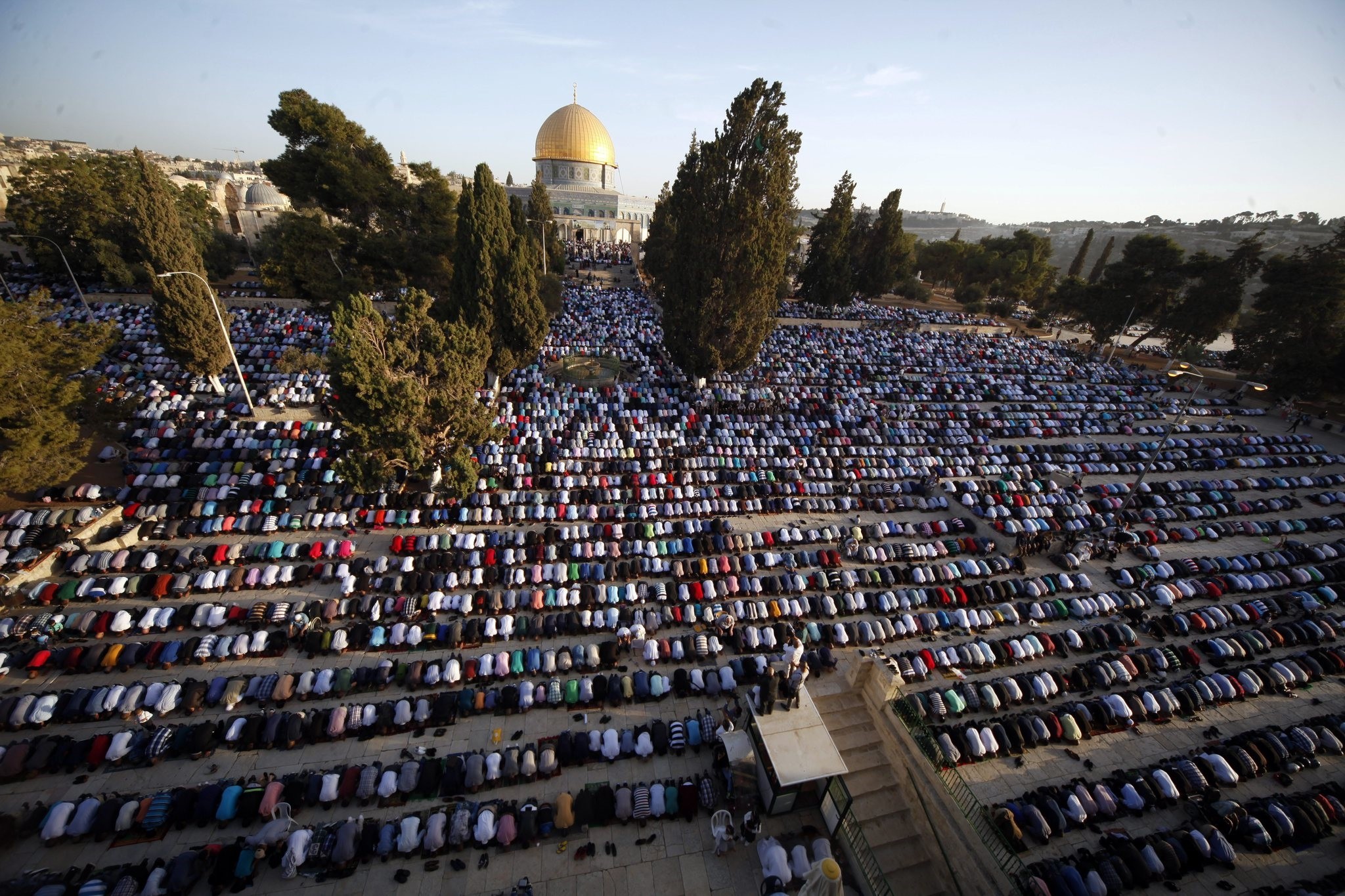 Palestinians pray during the Muslim holiday of Eid al-Adha, near the Dome of the Rock Mosque in the Al Aqsa Mosque compound. (AP Photo)
