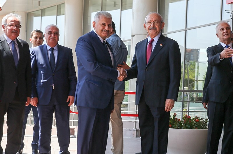 Prime Minister Binali Yu0131ldu0131ru0131m visited main opposition Republican People's Party (CHP) chairman Kemal Ku0131lu0131u00e7darou011flu at the party headquarters in Ankara. (AA Photo)