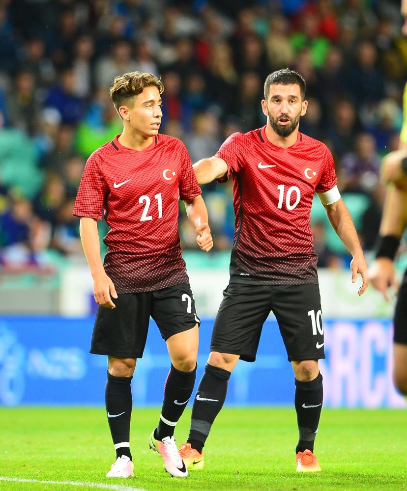 While youngster Emre Mor(L) shined for Turkey, Arda Turan on whom Turkish fans were largely pinning their hopes toiled at the Euros.