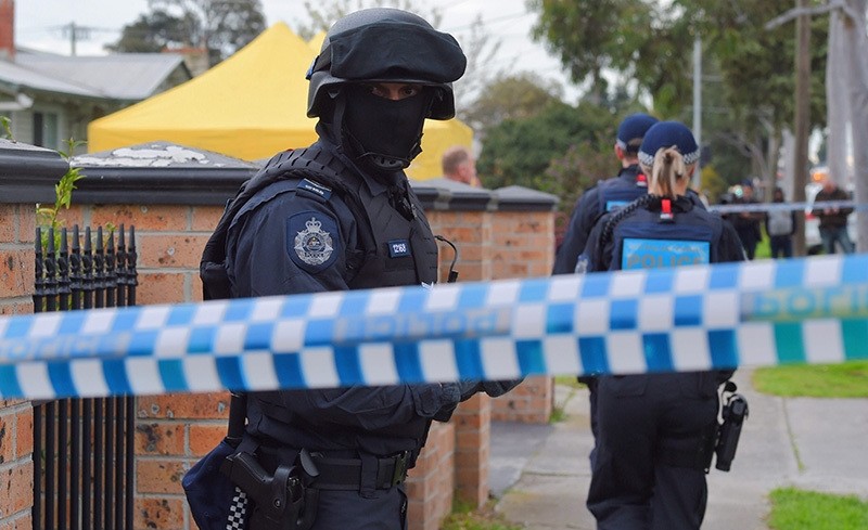 A picture made available on 07 August 2016 shows Australian Federal Police (AFP) officers conducting a terror raid at a house on Ballarat Rd in Braybrook, a suburb west of Melbourne (EPA Photo)