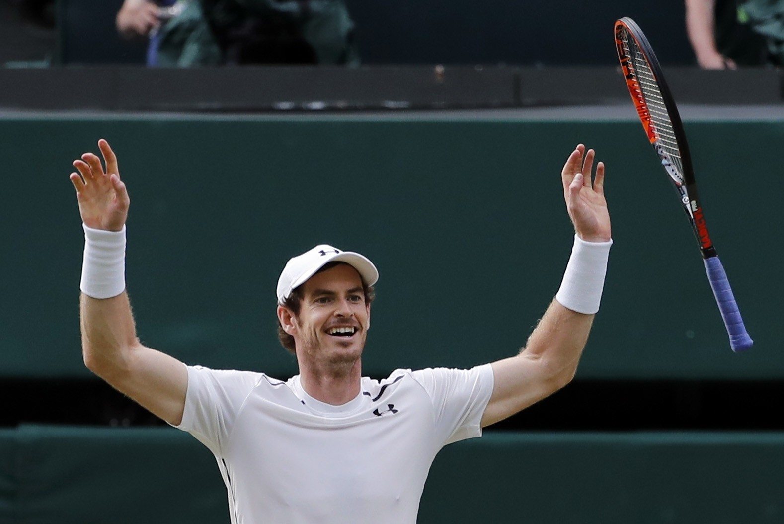 Andy Murray of Britain celebrates after beating Milos Raonic of Canada in the men's singles final on the fourteenth day of the Wimbledon Tennis Championships in London, Sunday, July 10, 2016. (AP Photo)