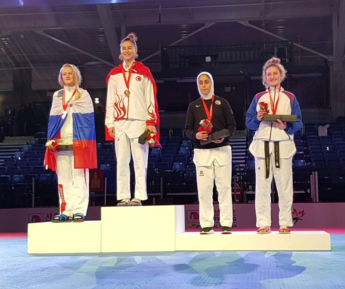 Seyma Nur Sogut took gold in the female under-63 kilograms category on the fourth day of the championships in Burnaby. (AA Photo)
