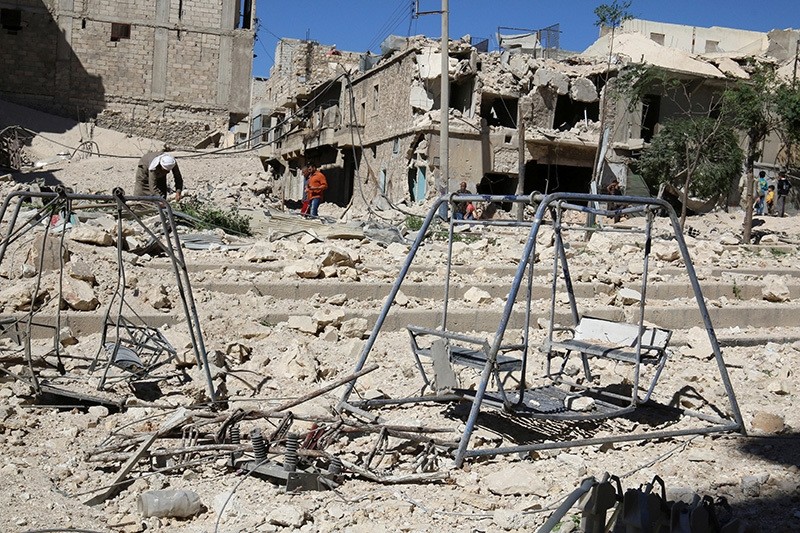 Swings are seen in a damaged site after airstrikes on the opposition-held Tariq al-Bab neighbourhood of Aleppo, Syria September 24, 2016 (Reuters Photo)