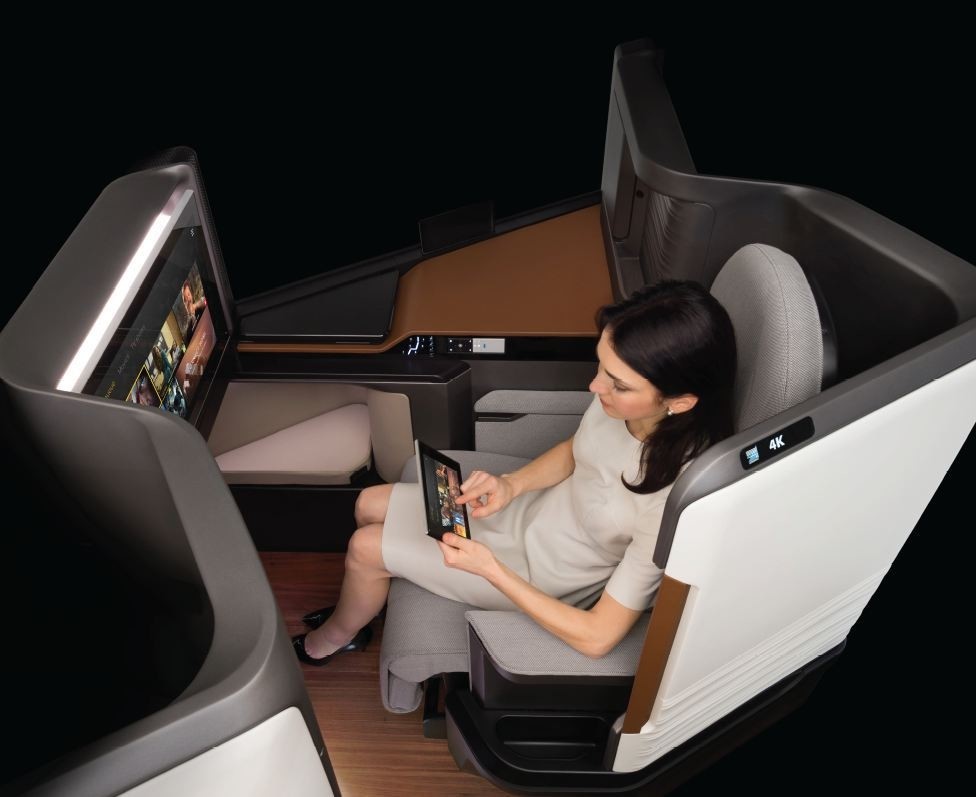 Panasonic's airplane seat equipped with luxury entertainment technology.