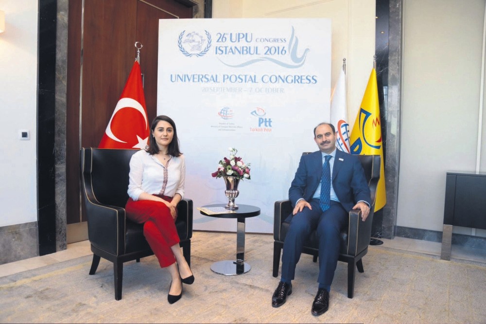 Post and Telegraph Organization (PTT) General Manager Kenan Bozgeyik (R) speaks to Daily Sabah's Merve Baran about the objectives of 26th Universal Postal Congress