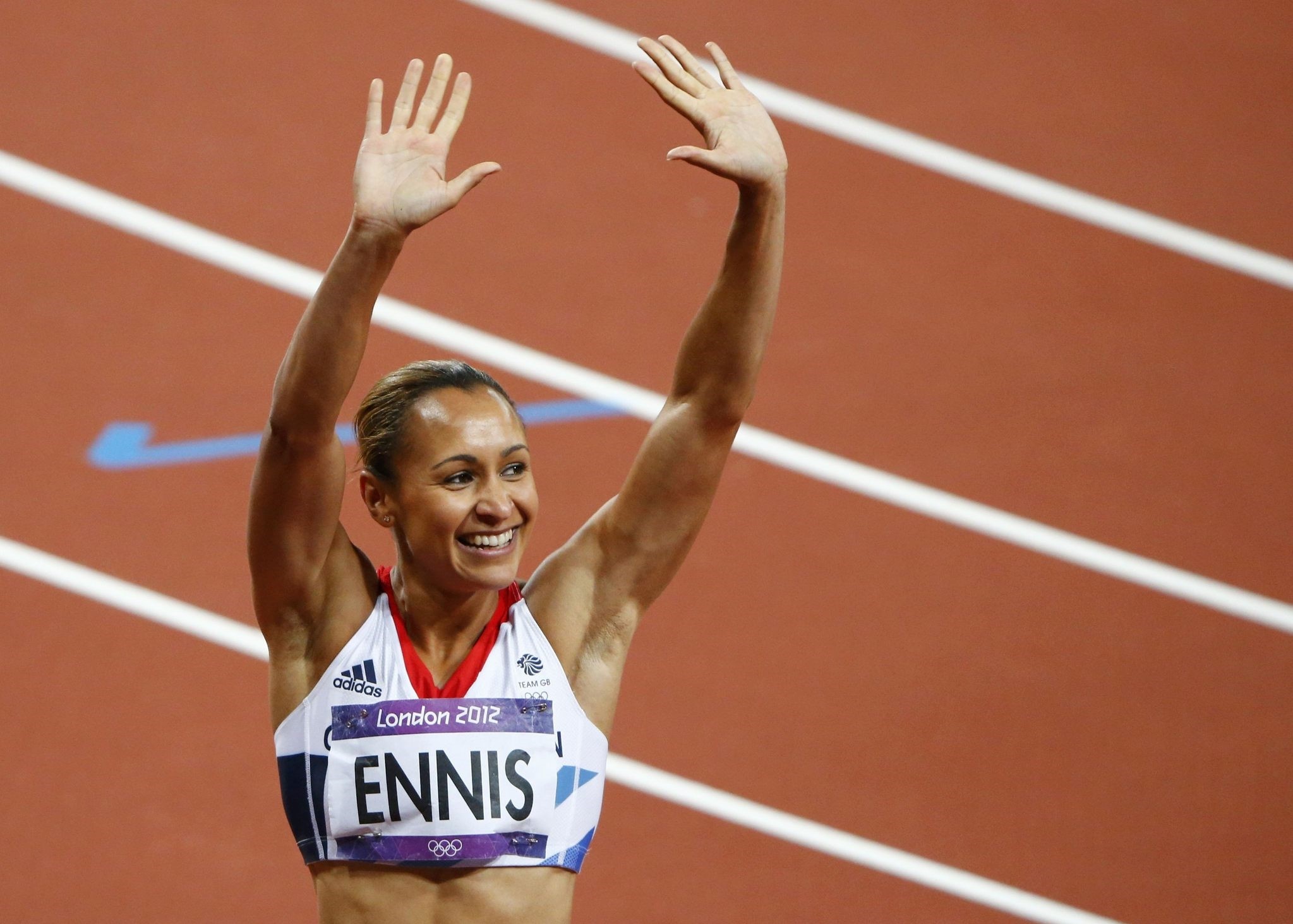 Britain's Jessica Ennis celebrates after finishing first in her women's heptathlon 200m heat at the London 2012 Olympic Games at the Olympic Stadium August 3, 2012. (REUTERS Photo)