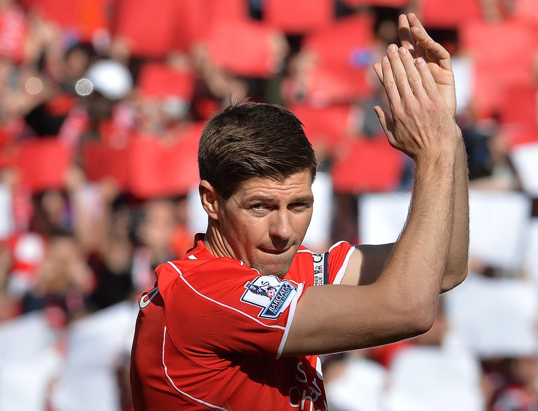 A file picture of Liverpool's Steven Gerrard applauding fans during the English Premier League soccer match between Liverpool and Crystal Palace at the Anfield in Liverpool, Britain, 16 April 2015. (EPA Photo)
