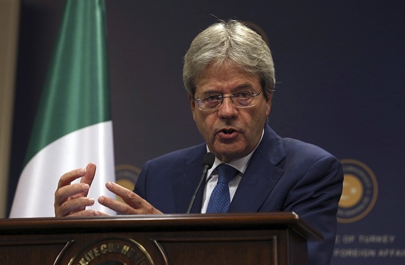 In this Thursday, Oct. 6, 2016 file photo, Italian Foreign Minister Paolo Gentiloni talks during a joint press conference with FM Mevlu00fct u00c7avuu015fou011flu (AP Photo)