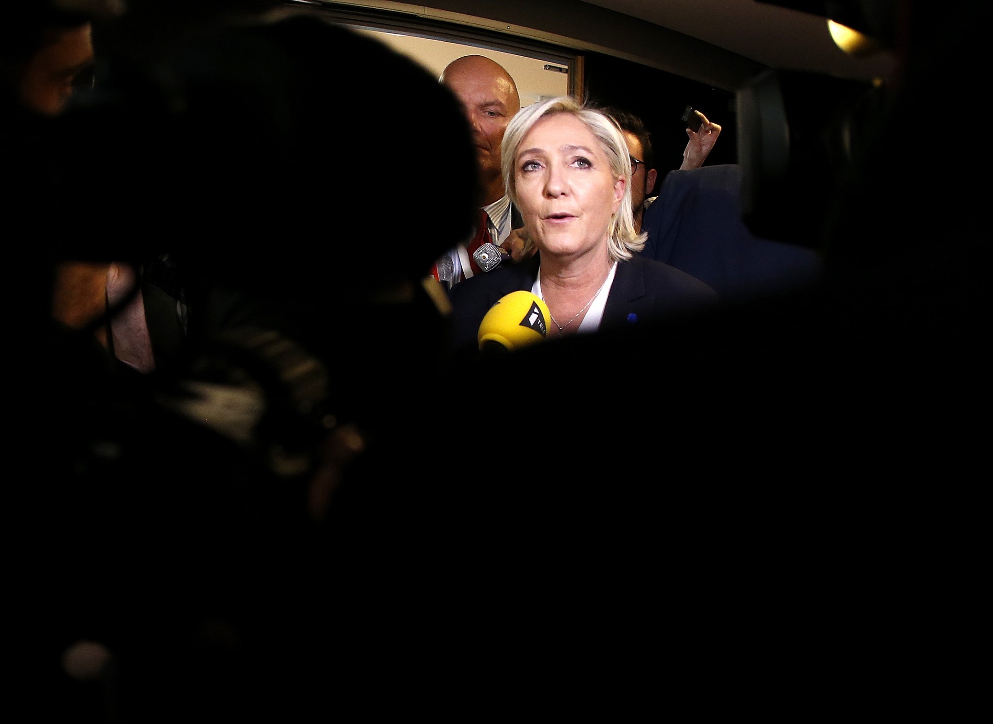 Far-right leader and candidate for next spring presidential elections Marine le Pen from France answers questions of journalists, in Germany, Saturday, Jan. 21, 2017. (AP Photo)