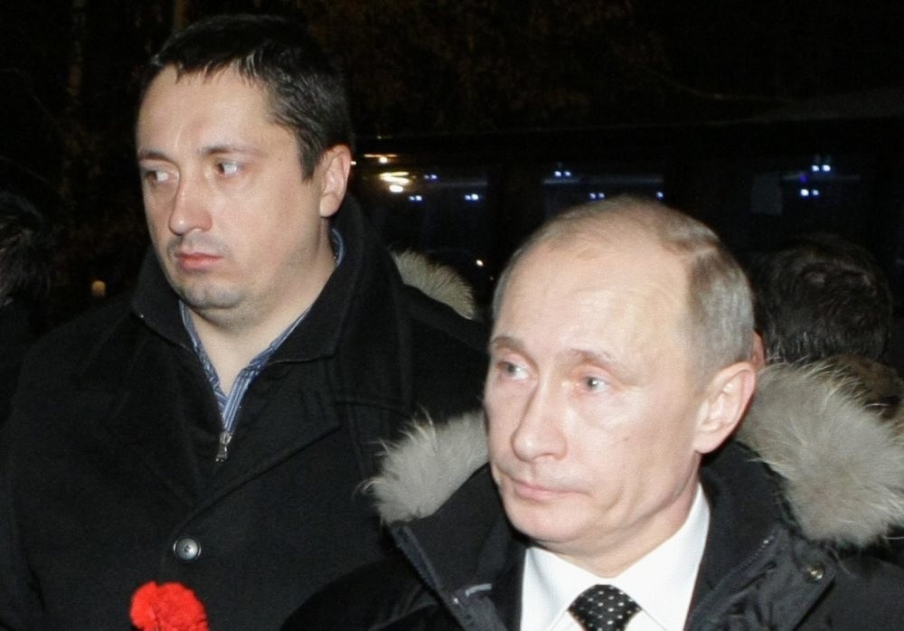Russian President Vladimir Putin (R) is seen with All-Russian Fan Association head Alexander Shprygin.