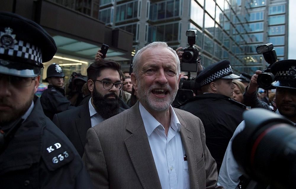 Leader of the Labour party Jeremy Corbyn (C) leaves the Labour Party Headquarters in London, Britain, 12 July 2016. (EPA Photo)
