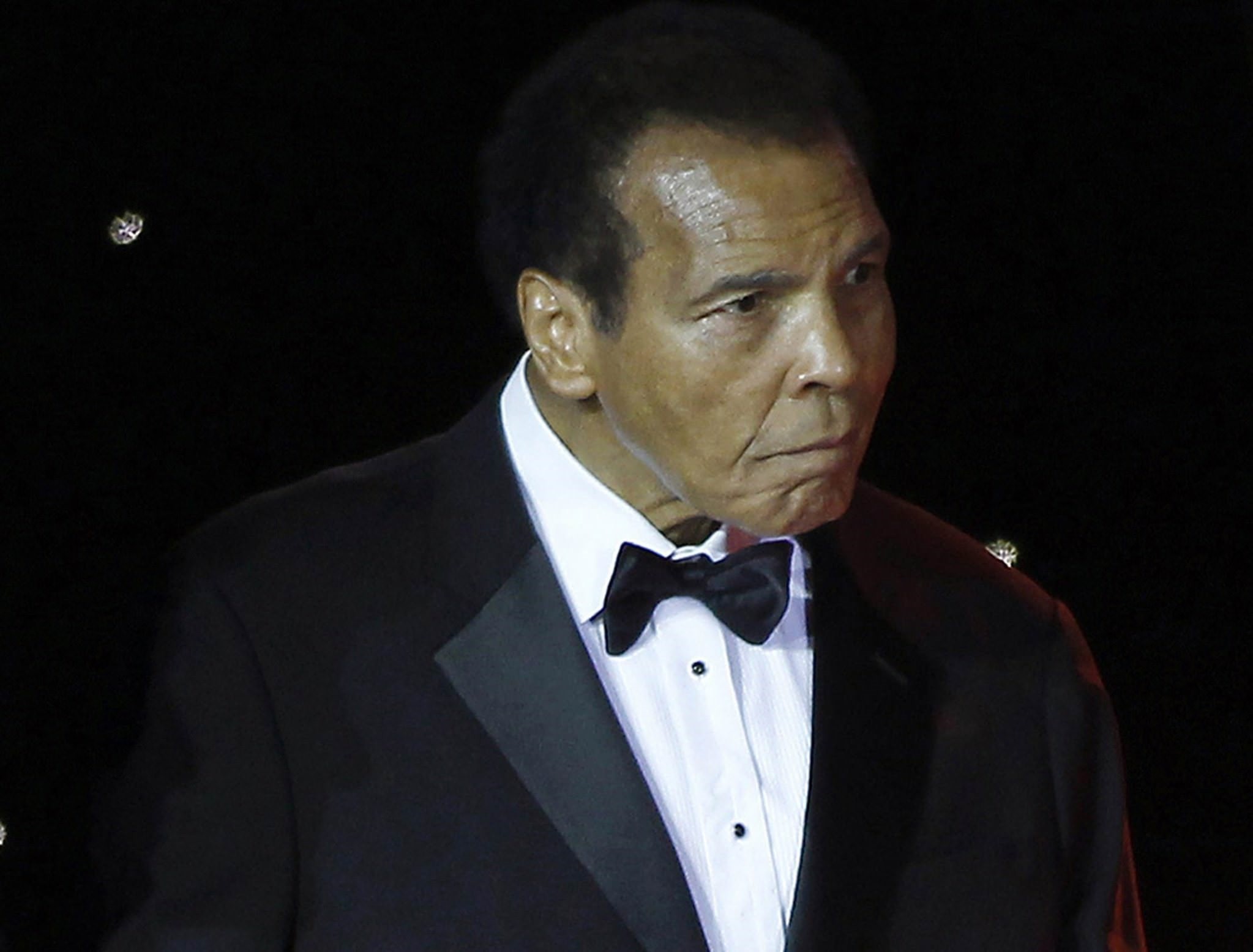 EMuhammed Ali is escorted on stage during The Muhammad Ali Celebrity Fight Night Awards XIX in Phoenix, Arizona in this March 23, 2013 file photo. (Reuters Photo)