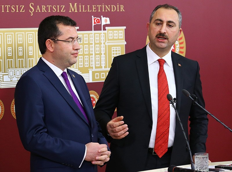 MHP deputy Parsak (L) and AK Party deputy Gu00fcl hold a press conference on constitutional reform draft in Turkey's Parliament. (AA Photo)