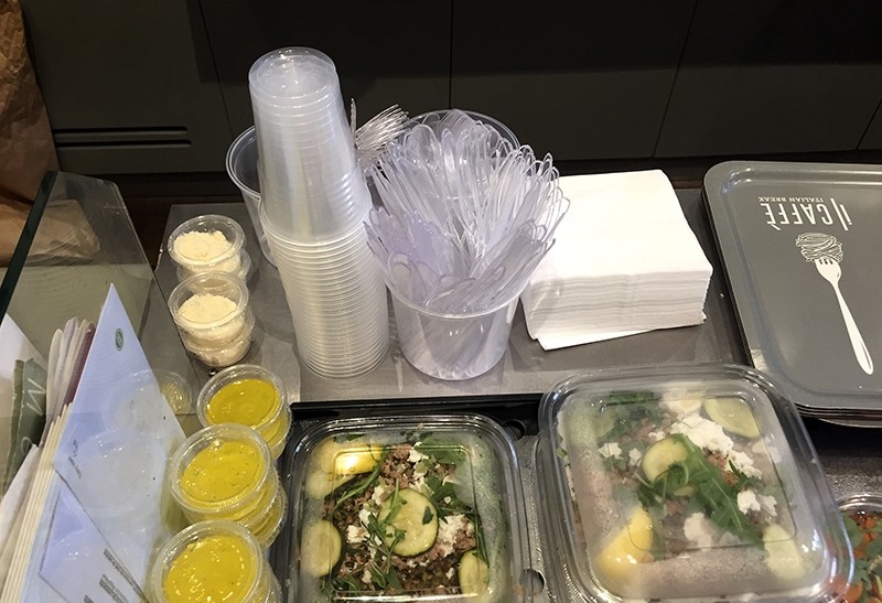 Plastic glasses, knives, forks and food boxes are pictured in a takeaway restaurant in Paris Tuesday, Sept. 6, 2016. (AP Photo)