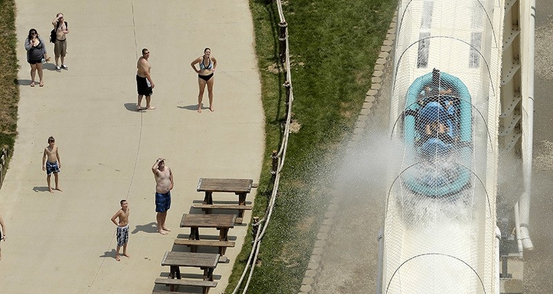 In this file photo, riders are propelled by jets of water as they go over a hump while riding a water slide called ,Verruckt, at Schlitterbahn Waterpark in Kansas City, Kan. (AP Photo)